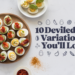 A variety of deviled eggs on a wooden platter with toppings like bacon, shrimp, and herbs. The text 10 Deviled Egg Variations Youll Love is displayed. Nearby ingredients including avocado, bacon, and spices are scattered on a white surface—perfect for those seeking creative egg recipes.