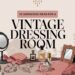 Illustration of a vintage dressing room setup, beautifully showcasing mirror, jewelry, perfume bottles, fabric, and lace on a table. Text reads 10 Gorgeous Vintage Dressing Room Ideas. Decorative elements include floral patterns and hanging lights.