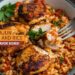 A bowl of spicy Cajun chicken and rice is garnished with parsley. A fork holds a piece of juicy chicken. Text overlay reads: SPICY CAJUN CHICKEN AND RICE - ONE-PAN FLAVOR BOMB! Lemon wedges are on the side.