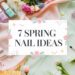 Discover the essence of spring with our curated 7 Spring Nail Ideas. Immerse yourself in a pastel paradise as delicate nail polish bottles and manicure tools encircle a charming white floral sign against a backdrop of soft pink and green fabrics, beautifully adorned with fresh blossoms.