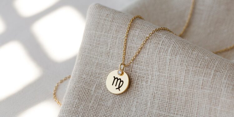 Discover a stunning gold necklace featuring the Virgo zodiac symbol and a sparkling gemstone—an elegant, personalized accessory for anyone who loves meaningful, zodiac-inspired jewelry.