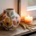 Cozy Autumn Home Decor: Colorful Ceramic Vase, Wheat Stalks & Candle Display Ideas by the Window.