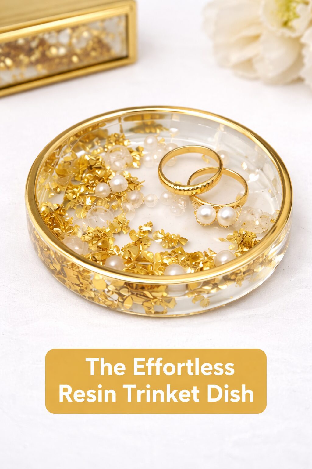 This next craft looks like it belongs in a high-end boutique with a price tag to match, but we'll know the secret: it’s one of the laziest crafts imaginable. We are making resin trinket dishes and coasters. The appeal of resin is undeniable—it's glossy, durable, and can suspend beautiful things like gold leaf and dried flowers in a glassy, solid form. People assume resin art takes a ton of skill, but honestly, if you can stir, you can do this.